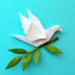 青い背景に折り紙で作られた鳥